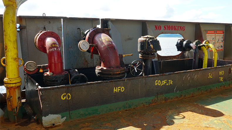 Manifolds and pipes with valves for bunkering to supply of diesel or heavy fuel to fuel tanks of container vessel situated on main deck from starboard and port side