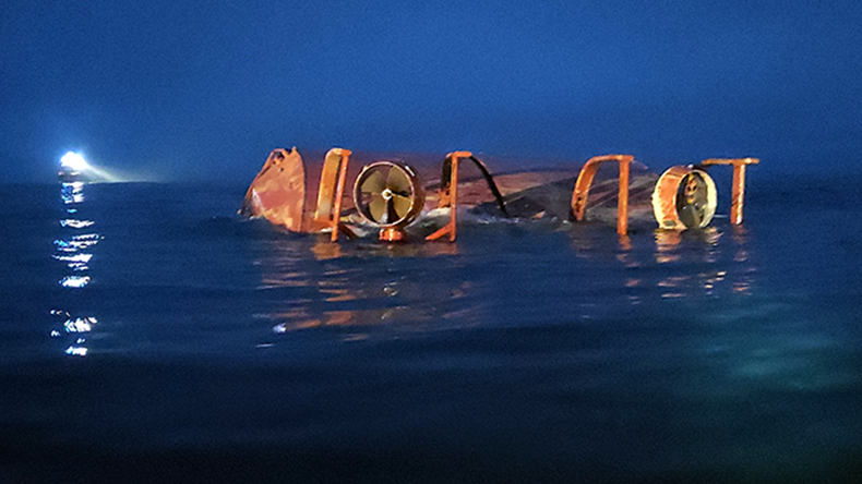 Scot Carrier and upturned hull of Karin Høj showing azimuth drive units at the stern