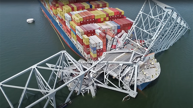 Baltimore bridge with road surface on top of Dali containership with bridge infrastructure