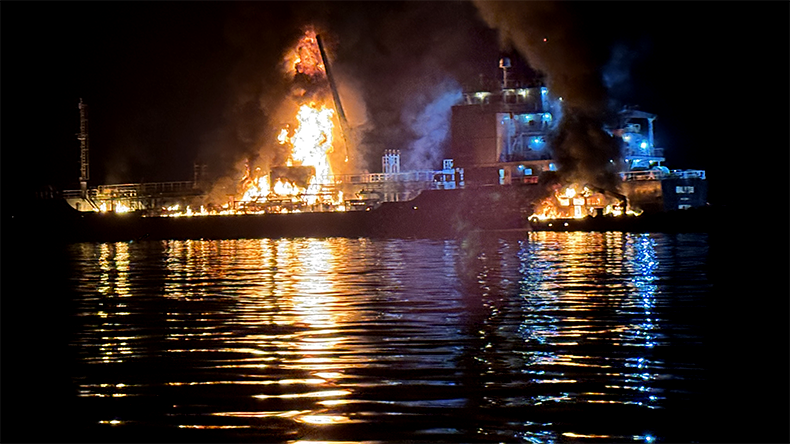 An oil tanker and a cargo ship anchored in Yeosu, a southern coastal city in South Korea, caught fire over the weekend, resulting in one death and two injuries