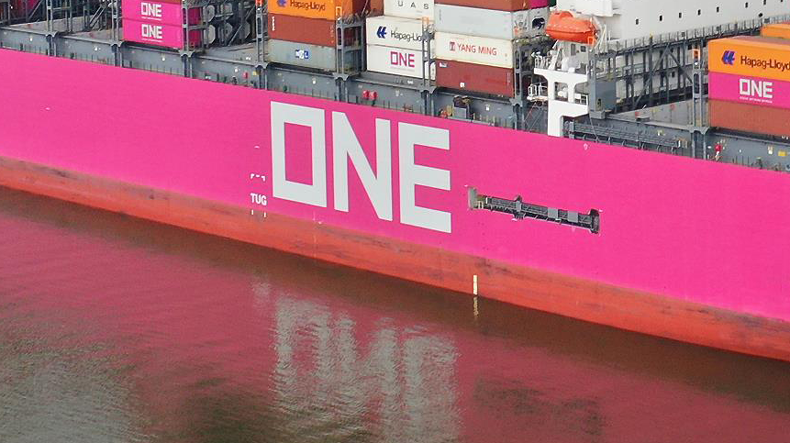 ONE name painted on side of ship