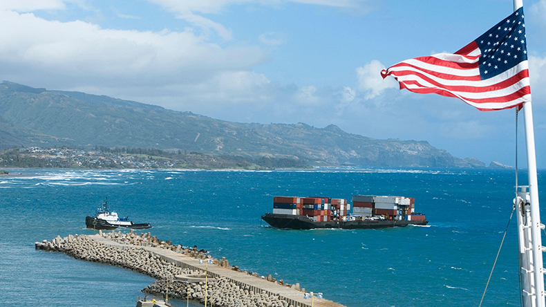 US flag at a commercial dock
