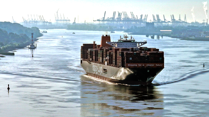 Brussels Express containership at Hamburg with view of cranes and port