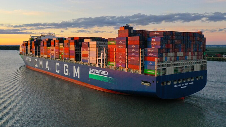 CMA CGM Jacques Saade leaving port with sunset 