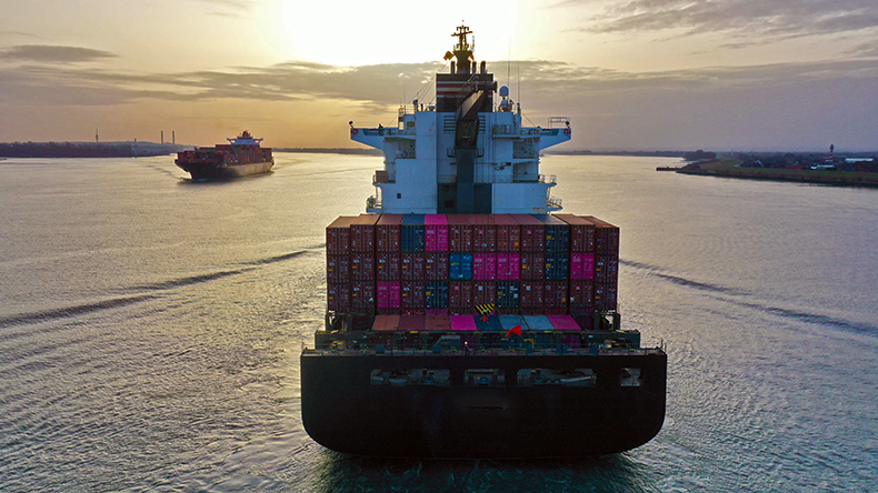 Two containerships passing on a river