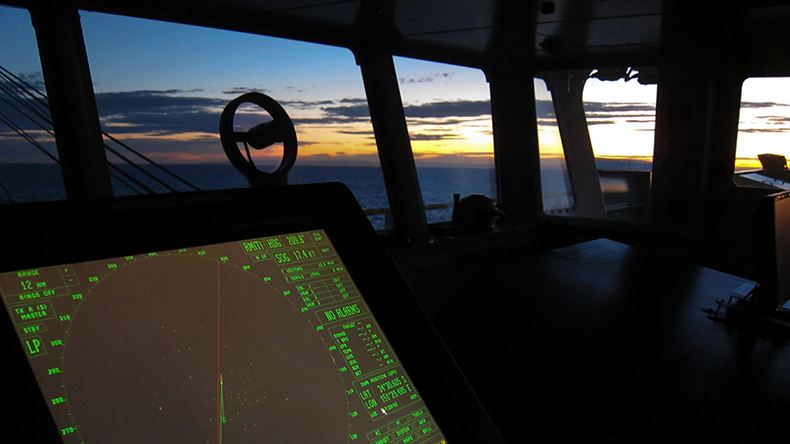 View from ship's bridge at dusk with radar
