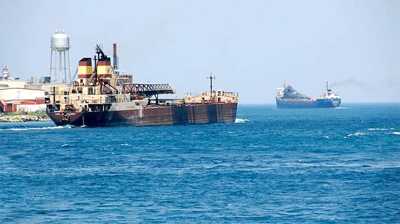 Lake Freighters sail on the Great Lakes And enter Lake Huron at Port Huron Michigan