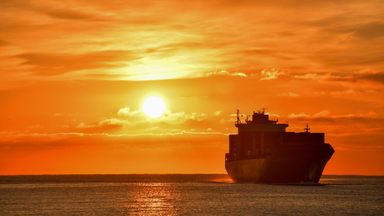 generic ship at sunset by adobe