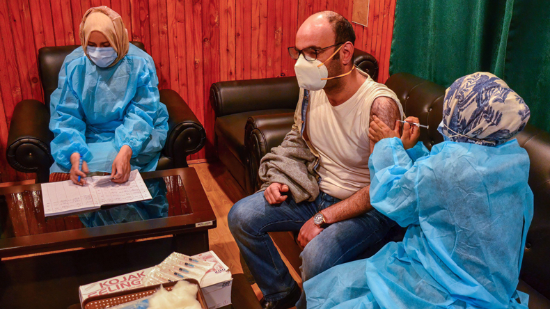 Covid vaccination in India. Credit  Saqib Majeed / SOPA Images / ZUMA Wire / Alamy Live News