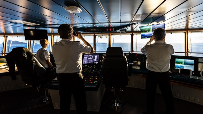 Captain and officers on the bridge of a ship Andrew Peacock/Getty Images