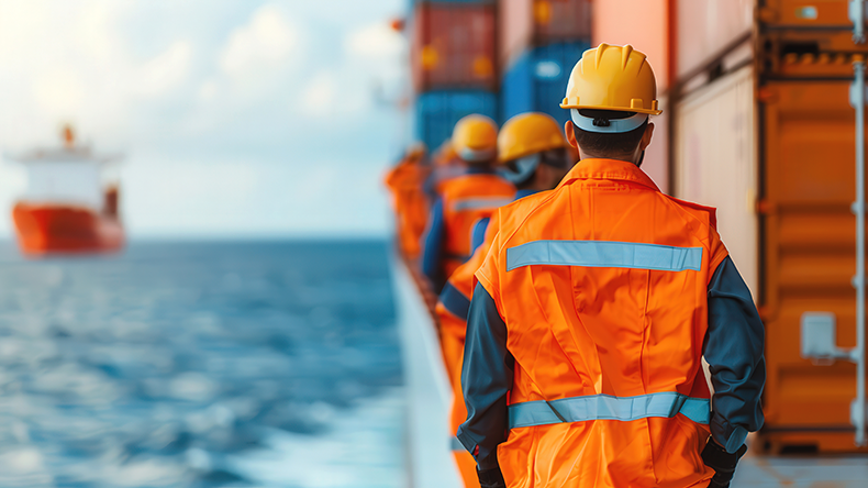 Crew on a cargo ship at sea
