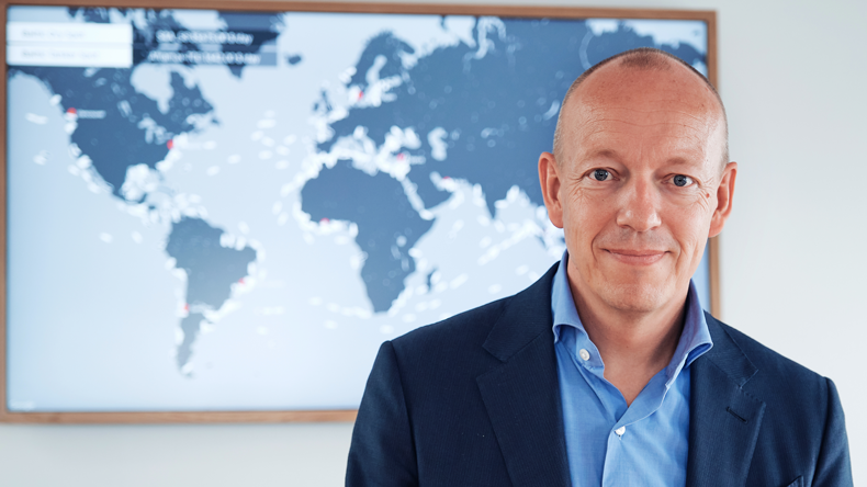 Norden chief executive Jan Rindbo with world map behind him