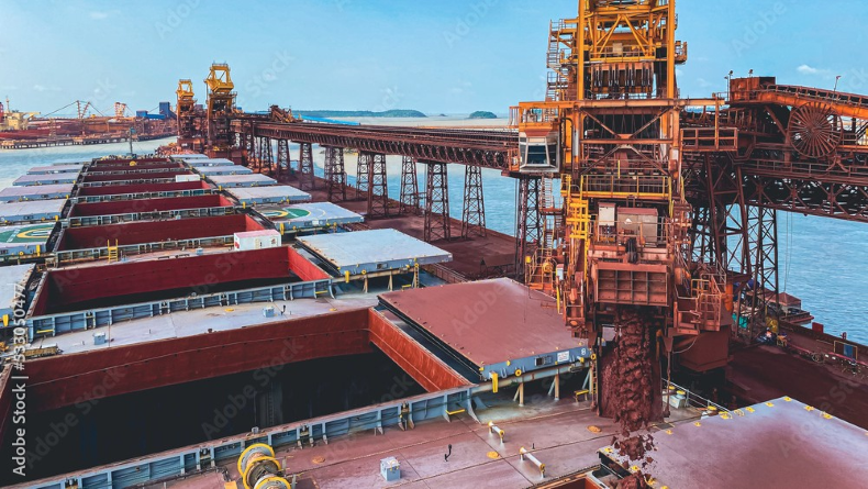 capesize loading iron ore adobe stock