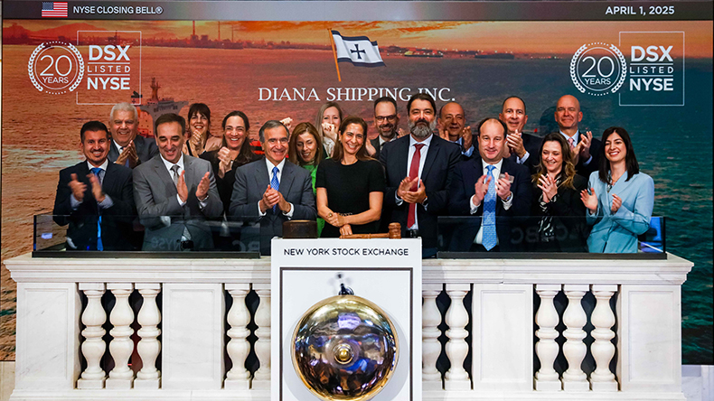 Diana Shipping chief executive Semiramis Paliou rings the closing bell at the NYSE on April 1, 2025 surrounded by core members of the Diana Shipping family