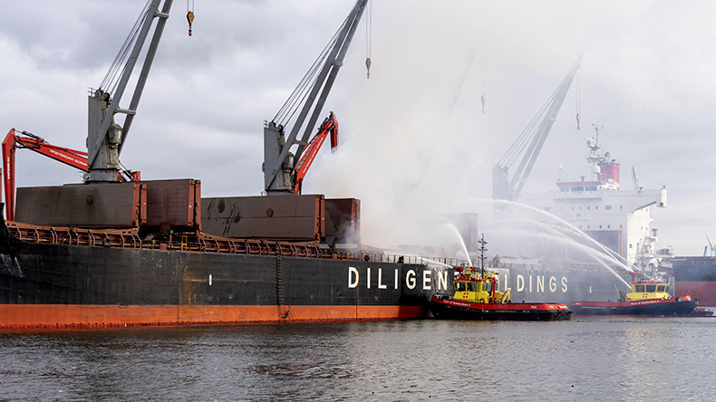 Amsterdam - Firefighters are busy in Amsterdam's Westelijk Havengebied putting out a large fire on a ship at Vlothavenweg