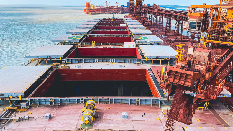 iron ore loading on capesize by adobe