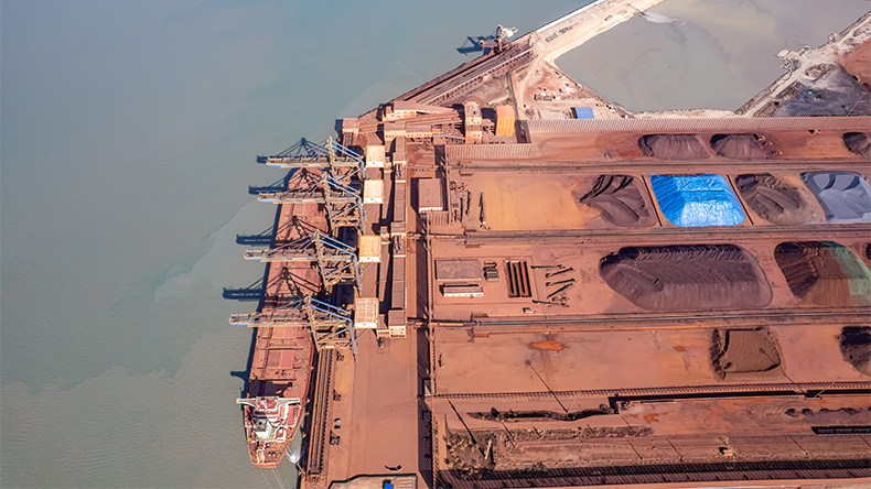 Iron ore port in China with bulker vessel loading