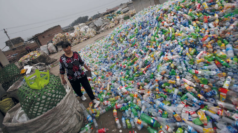 Plastic bottles at China recycling dump