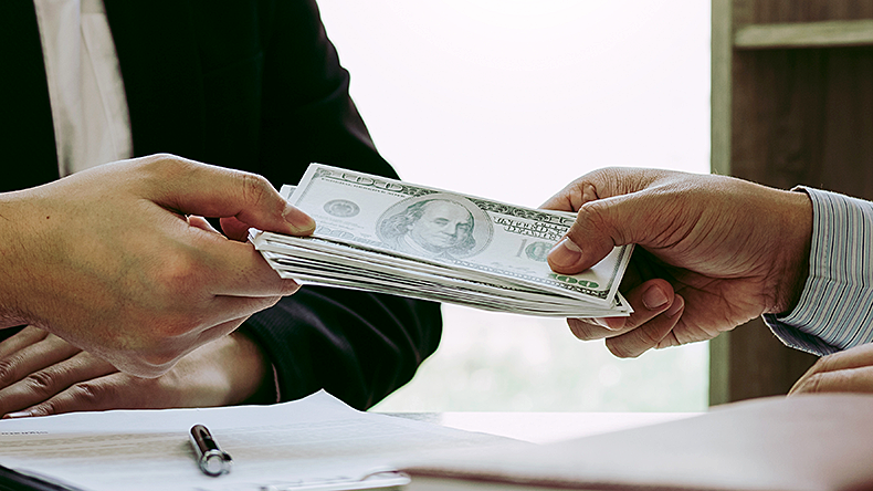 Lending money / bribes, paying a debt