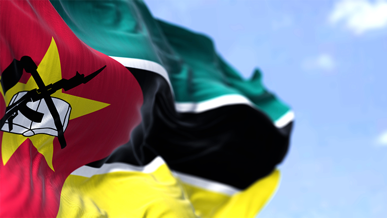 National flag of Mozambique waving in the wind on a clear day