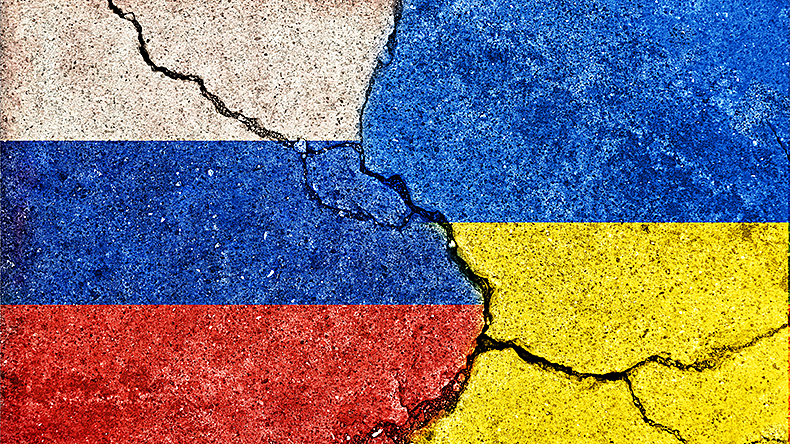 Illustration of the flags of Russia and Ukraine on cracked concrete.