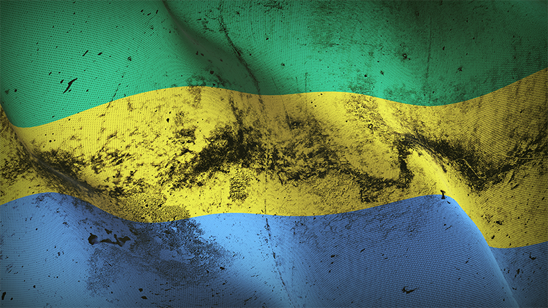 Gabonese dirty flag blowing on wind