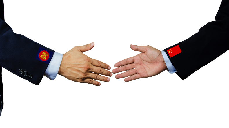 ASEAN and China handshake