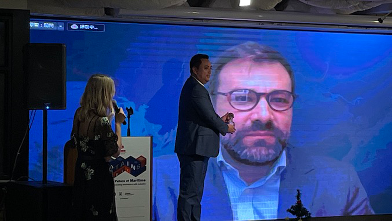 The third Captain’s Table innovation contest in Hong Kong, 2021. HFW partner Chris Chan making a virtual  award presentation to Krassimir Fotev of the winning entry 13 Mari. Picture Hong Kong Maritime Hub