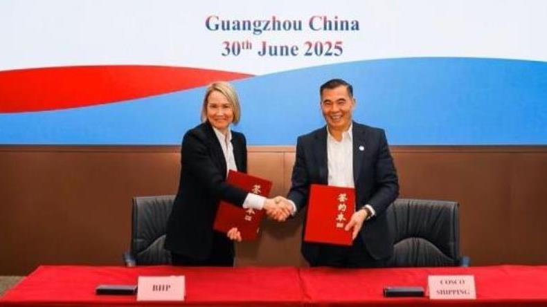 Emma Roberts of BHP and Ji Lin from Cosco at the signing ceremony