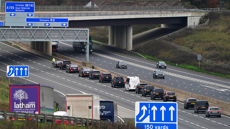 US President Joe Biden heading up the M8 to Glasgow for the start of COP26. Credit PA Images / Alamy Stock Photo