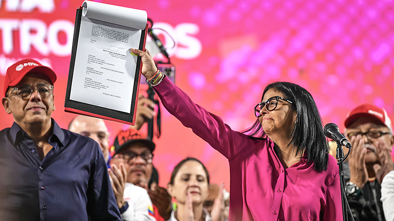 Delcy Rodriguez holds the new oil reform during an event at Miraflores Palace on January 29, 2026 in Caracas, Venezuela. 