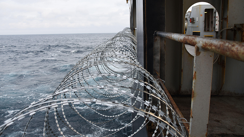 Barbed wire attached to the ship hull