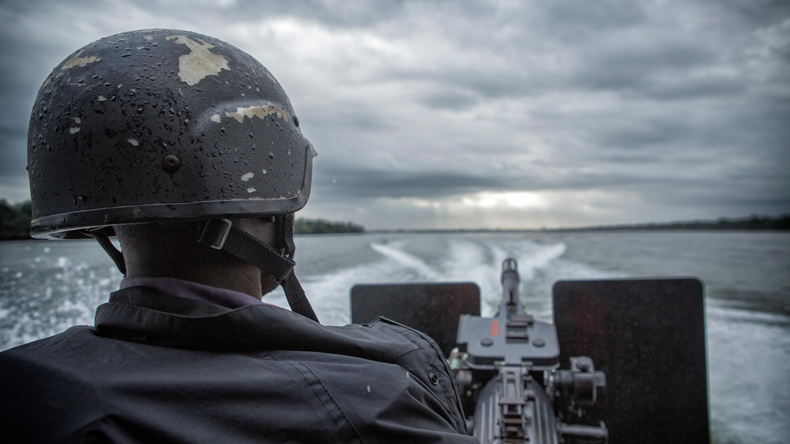 Nigerian navy patrol. Credit Rey T. Byhre / Alamy Stock Photo