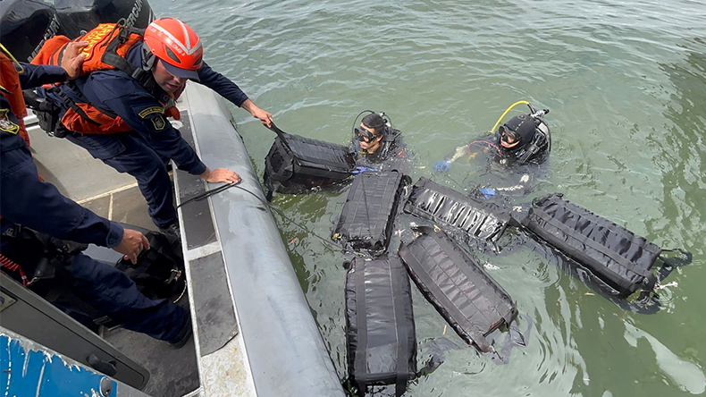 Colombian Navy with divers from the Buenaventura Coast Guard recovering bags of cocaine