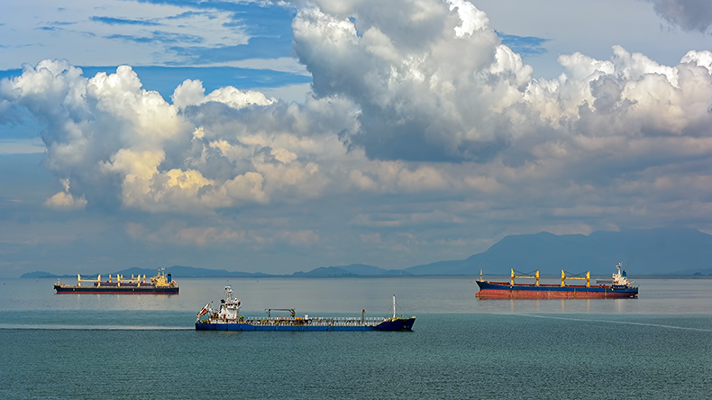 Strait of Malacca and Singapore with three ships passing each other