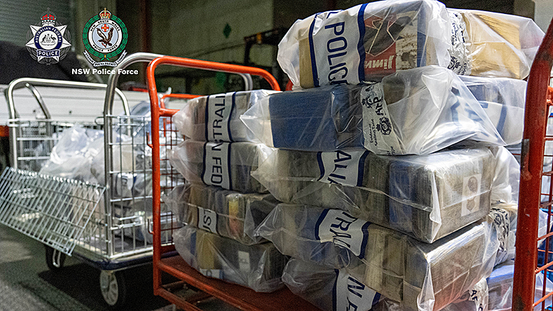 An image of 506kg of cocaine and $330,000 cash seized by the Australian Federal Police at a sea freight facility in Sydney.