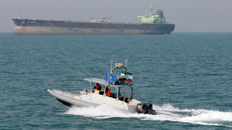 Iranian Revolutionary Guard speedboat with oil tanker 
