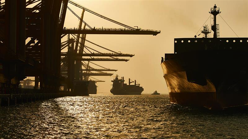 Vessels approaching Jebel Ali port at sunrise