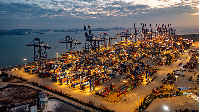 Yangpu port in Hainan - aerial view at dusk with shipping containers