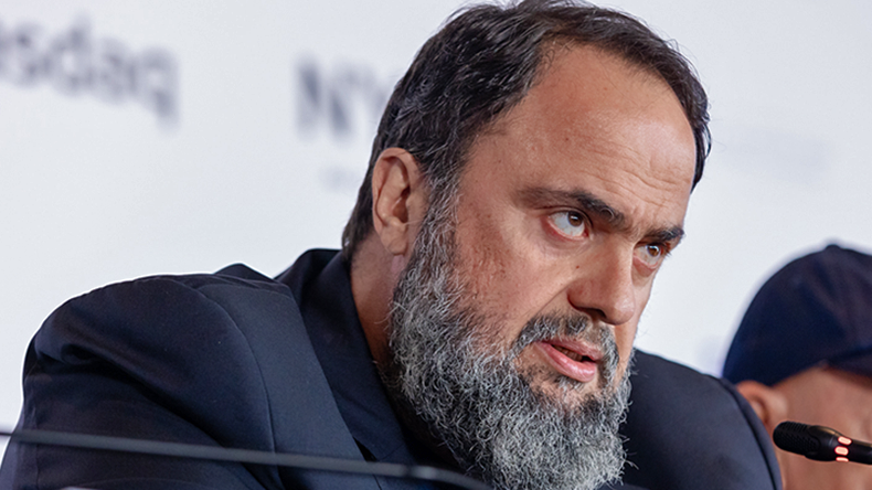 Evangelos Marinakis speaking at a conference