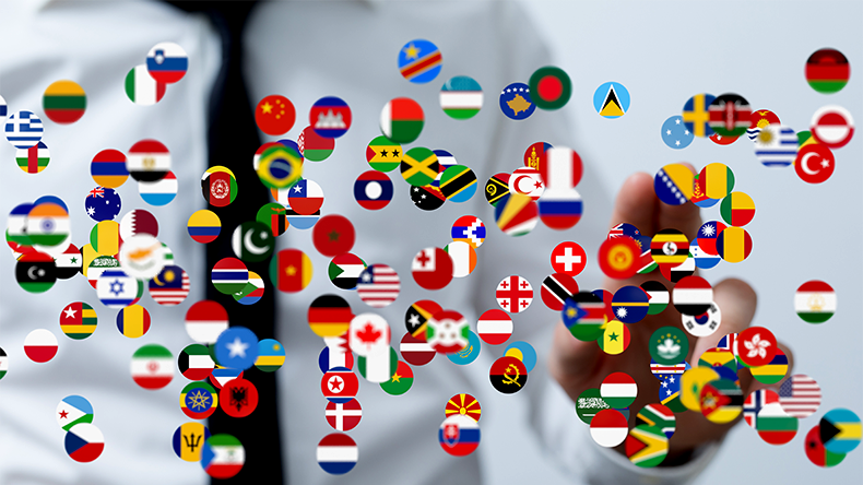 Image of diverse national flags symbolizing global business, international trade, and worldwide collaboration