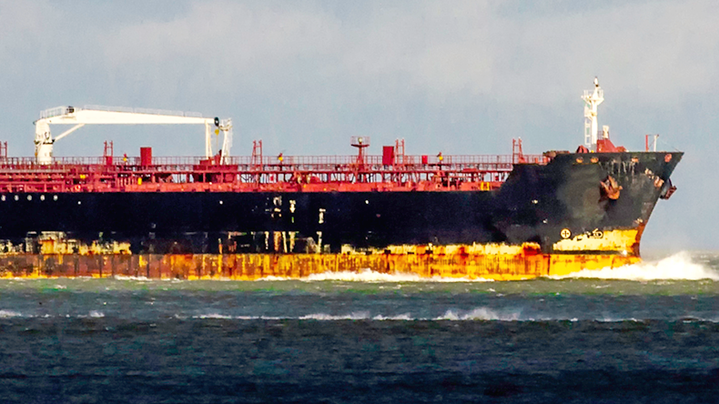 Rusty old ship at sea