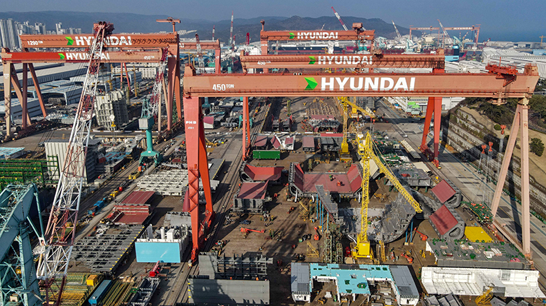 Gantry cranes at HD Hyundai Heavy Industries shipyard close-up view