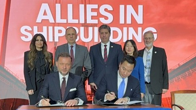  Panos Xenokostas of Onex (front left) and Alex Wong, global chief strategy officer of Hanwha Group sign the agreement in Washington