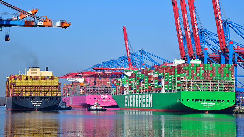 Evergreen, ONE and MSC containerships with reflections in the water