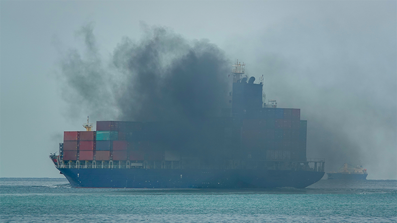 Smoke exhaust gas emissions carbon dioxide from containership at sea