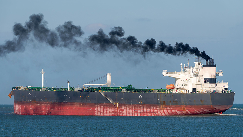 Tanker with black smoke from funnel