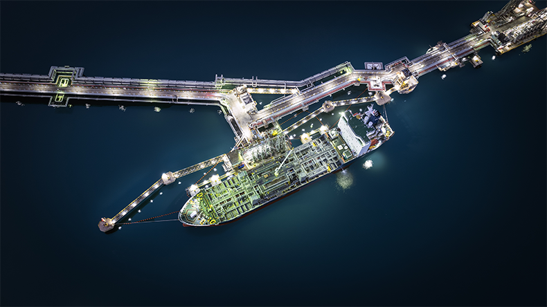 Product tanker at port lights at night