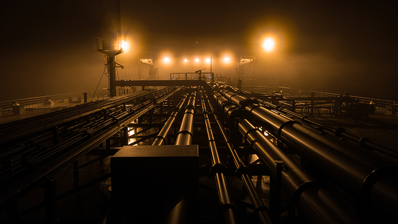 Cargo deck of tanker at night