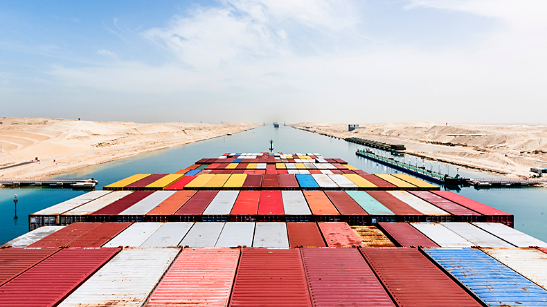 View on the containers loaded on deck of cargo ship. Vessel is transiting Suez Canal